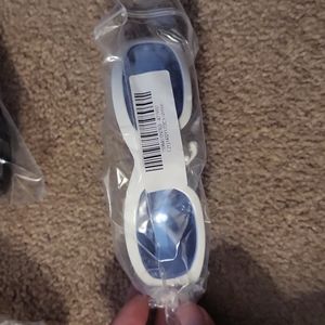 White framed blue lens sunglasses